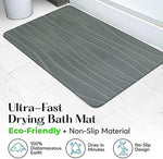 Graplife green stone bath mat styled in modern bathroom