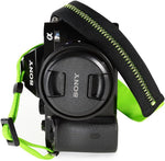 Side angle view of padded shoulder strap for compact cameras