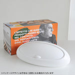 White Alessi Gnam bread container in kitchen interior