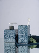 Wenko Cordoba Blue ceramic dispenser next to sink