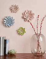SEINHIJO handmade floral art piece displayed in a modern bedroom