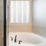 Arayarser waterproof plastic shower curtain white front view hanging on a small bathroom window frame