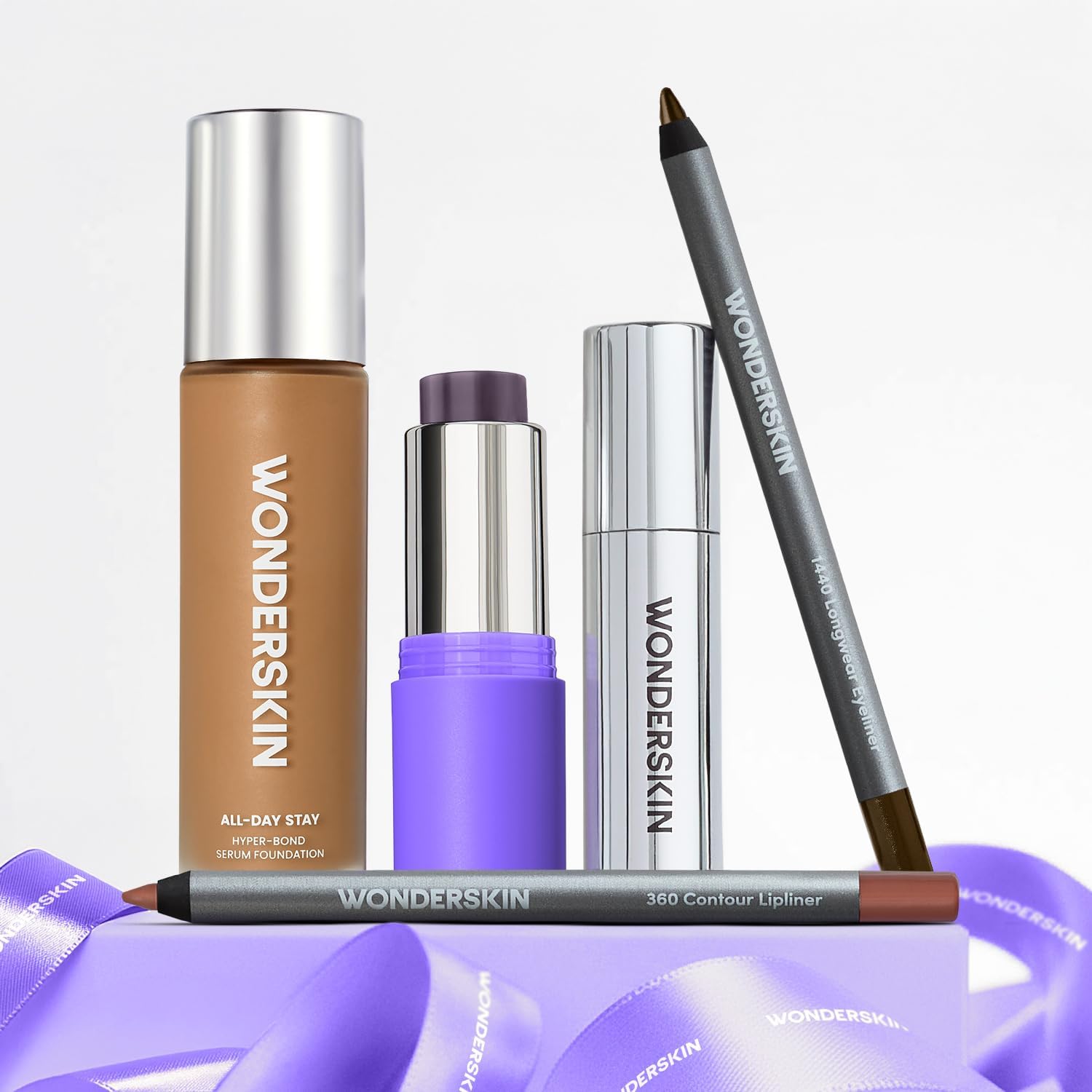 Wonderskin Woke Up Like This All-Day Stay Set front view with foundation and liner