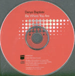 Open jewel case showing the compact disc and interior booklet insert
