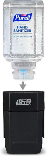 Purell manual push style dispenser mounted on a wall surface