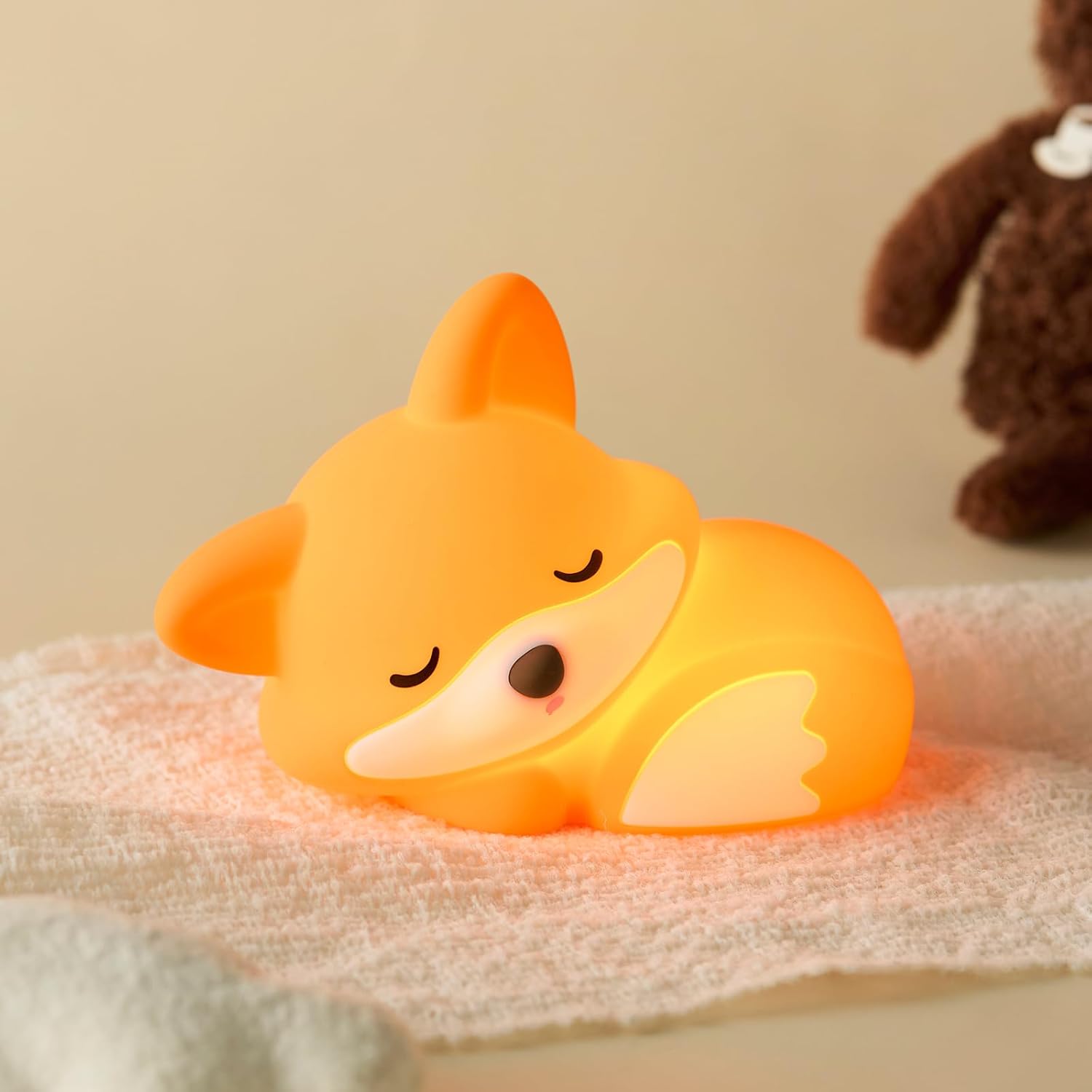 Atsui Fox Night Light front view showing orange glow
