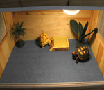 Grey reptile carpet dimensions being measured for custom terrarium setup.