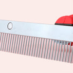Close up of metal teeth on Octchoco dog grooming tool