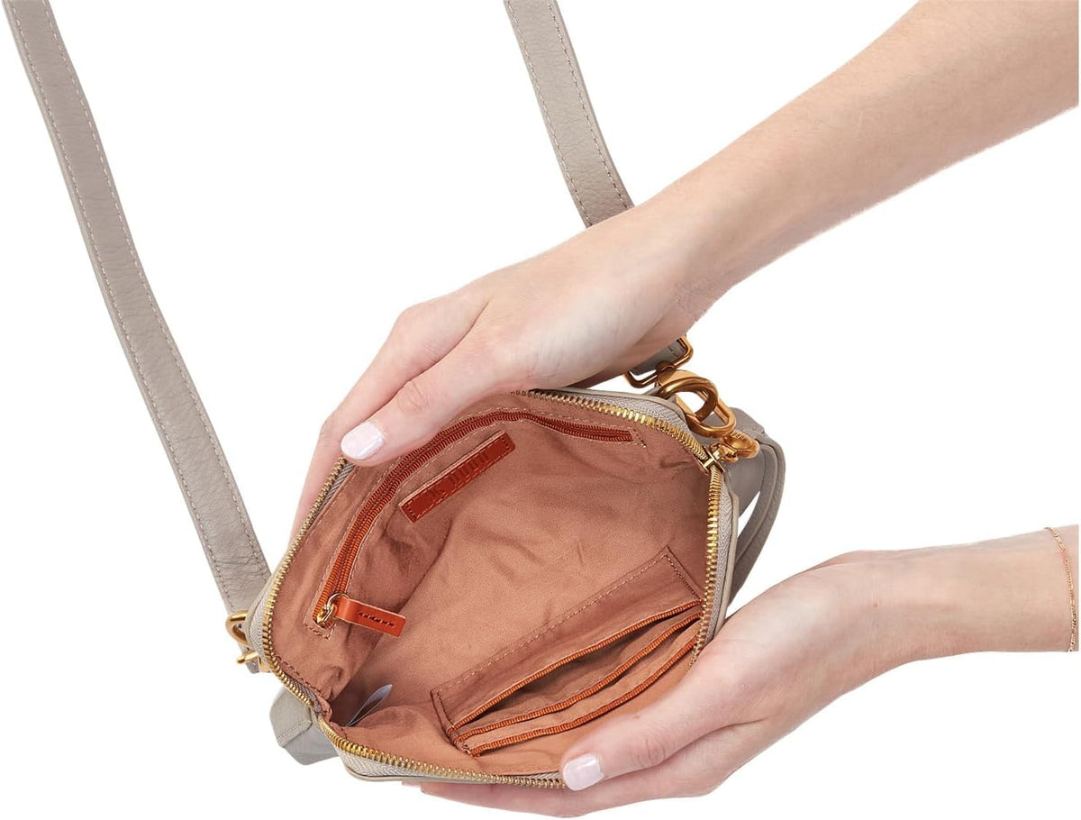 HOBO Fern Slim Belt Bag side angle showing zipper and hardware