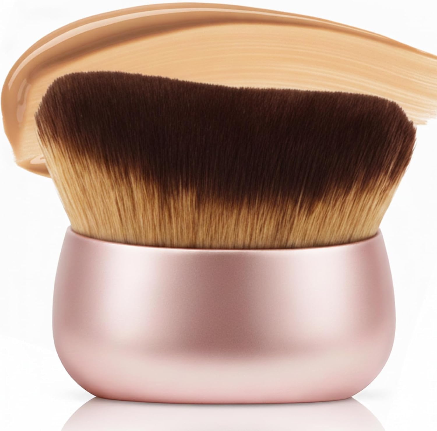GOERTI Streak-Free Kabuki Self Tanner Brush front view showing dense pink bristles and rose gold handle
