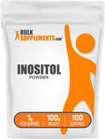 Unflavored inositol supplement powder being measured out with a teaspoon.