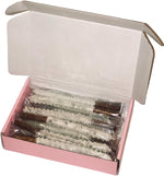 Elegant white and silver dessert pretzel rods arranged for a party