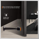 KOVOSCH matte black door stopper installed on baseboard
