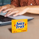 Authentic American import Juicy Fruit gum pack showing the iconic bright yellow design.