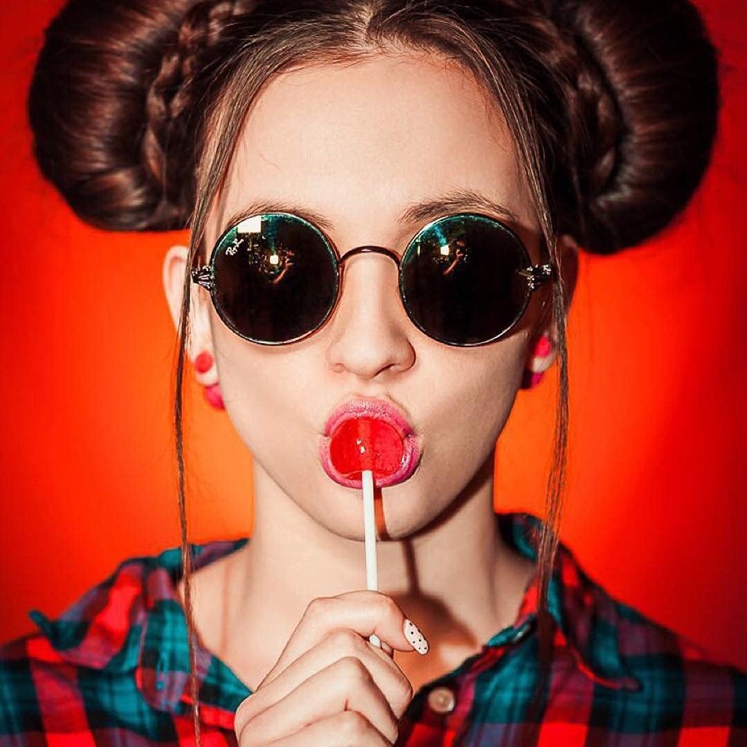 Fat free and peanut free gourmet lollipops in vibrant multicolor swirl