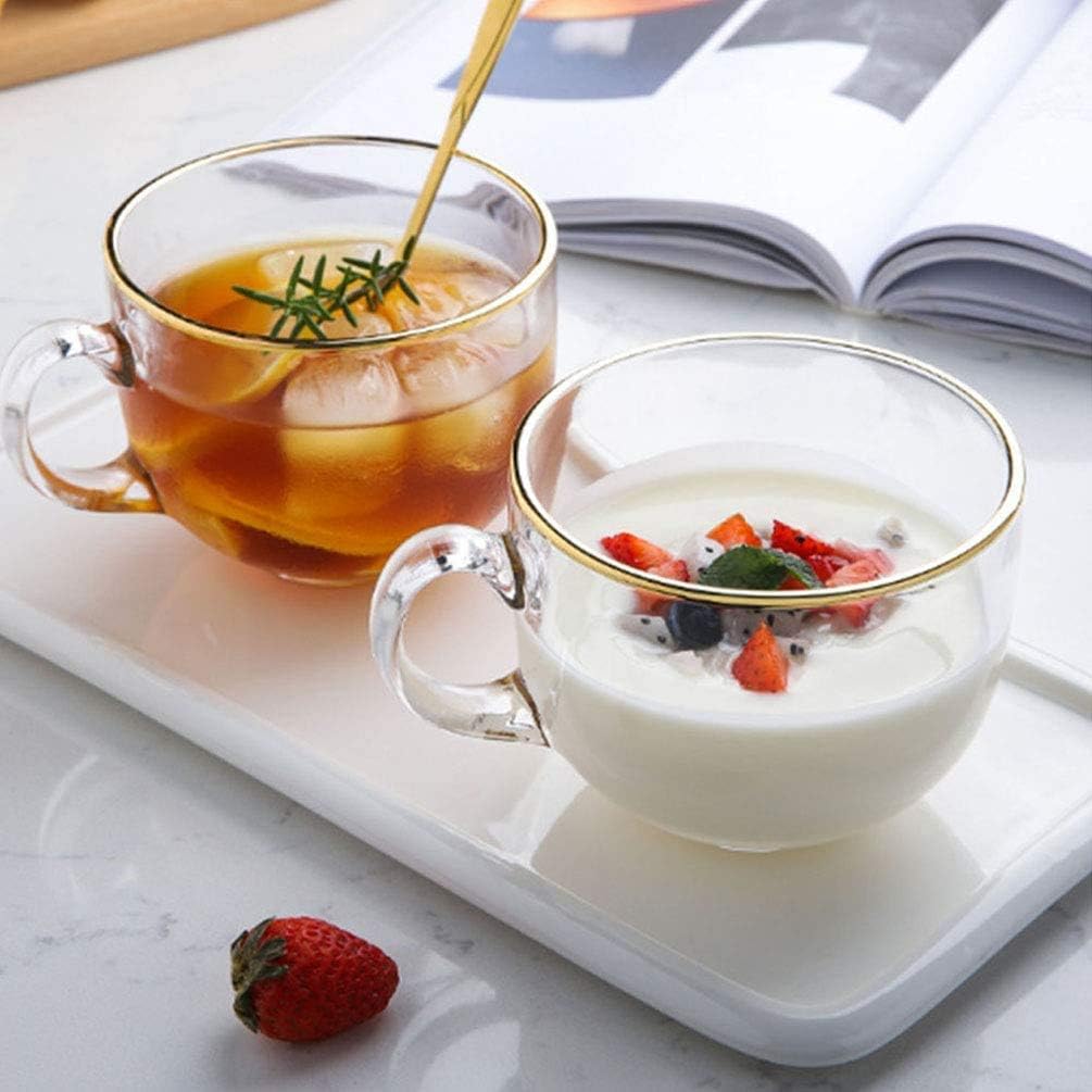 KKGUD 16 fluid ounce coffee mugs displayed with matching gold spoons