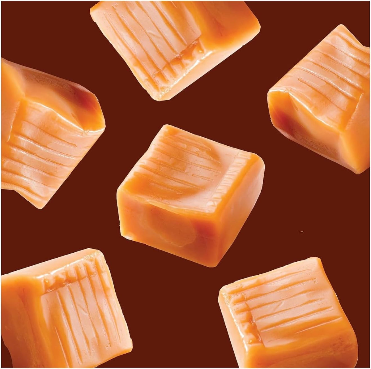Kraft individually wrapped chewy caramel squares spread out on a table