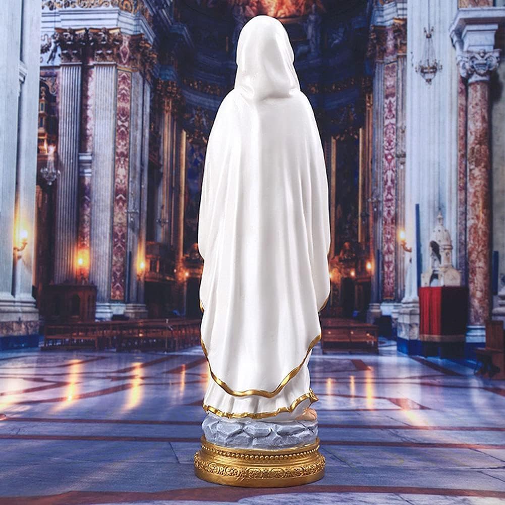Our Lady of Lourdes statue on altar display