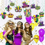 Mardi Gras masquerade party venue setup with ceiling decor pieces