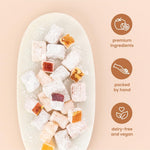 Assorted berry flavors and nuts visible inside Liberty Orchards 10 ounce box.