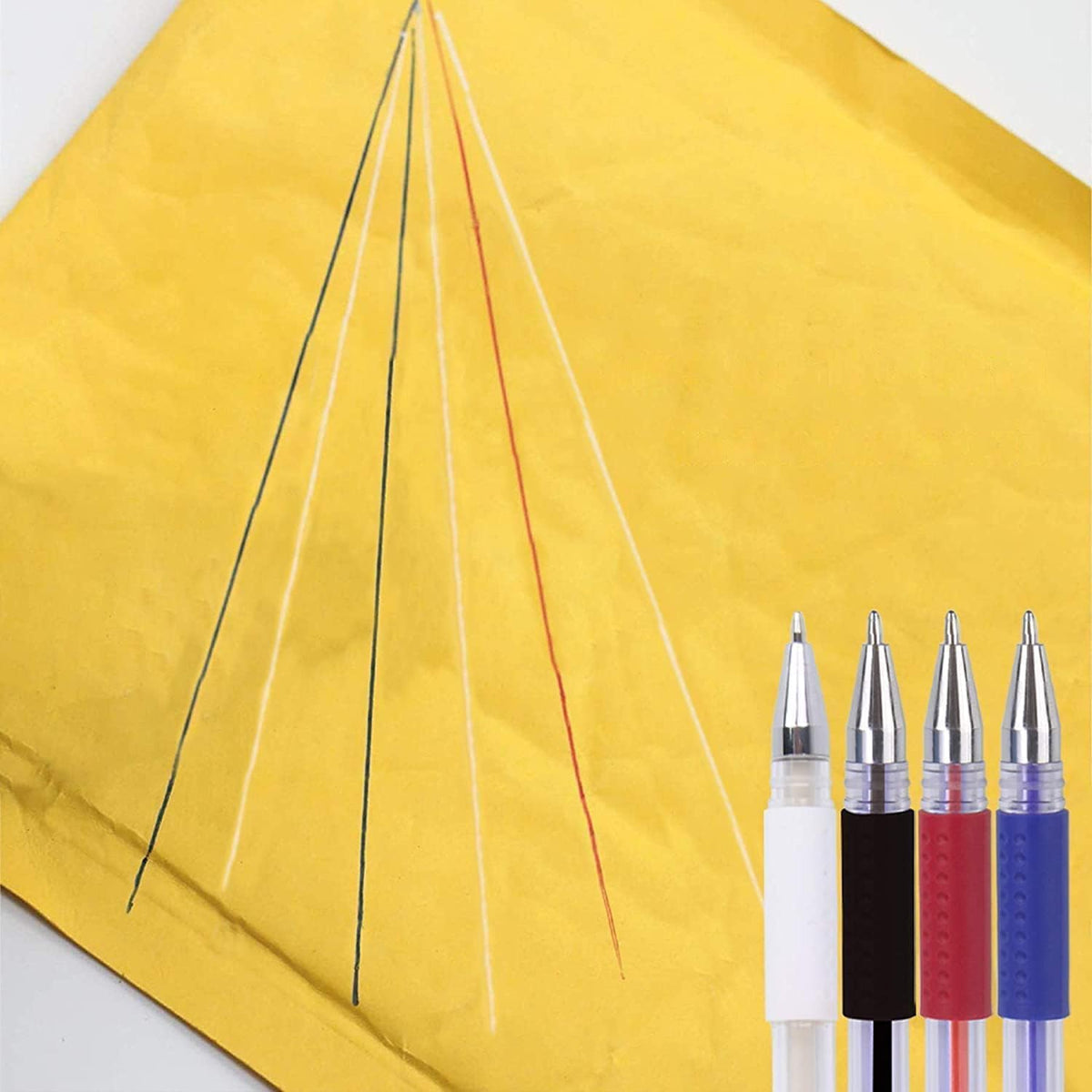 Assorted black white red and blue pen refills laid out neatly