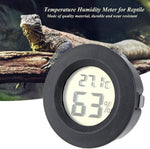 Mini digital LCD thermometer placed inside a greenhouse environment