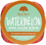 Top angle view of Tree Hut Watermelon body scrub jar open with pink sugar texture
