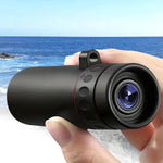 Vocue monocular compact mini telescope front view displaying the premium green film objective lens