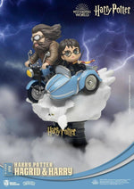 Hagrid with goggles and Harry in Gryffindor robes figure