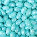 Just Candy light blue blueberry flavored chewy candies poured into a clear glass party bowl