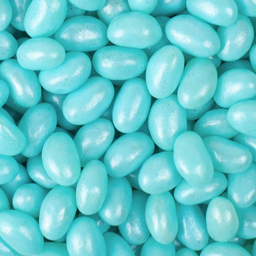 Just Candy light blue blueberry flavored chewy candies poured into a clear glass party bowl