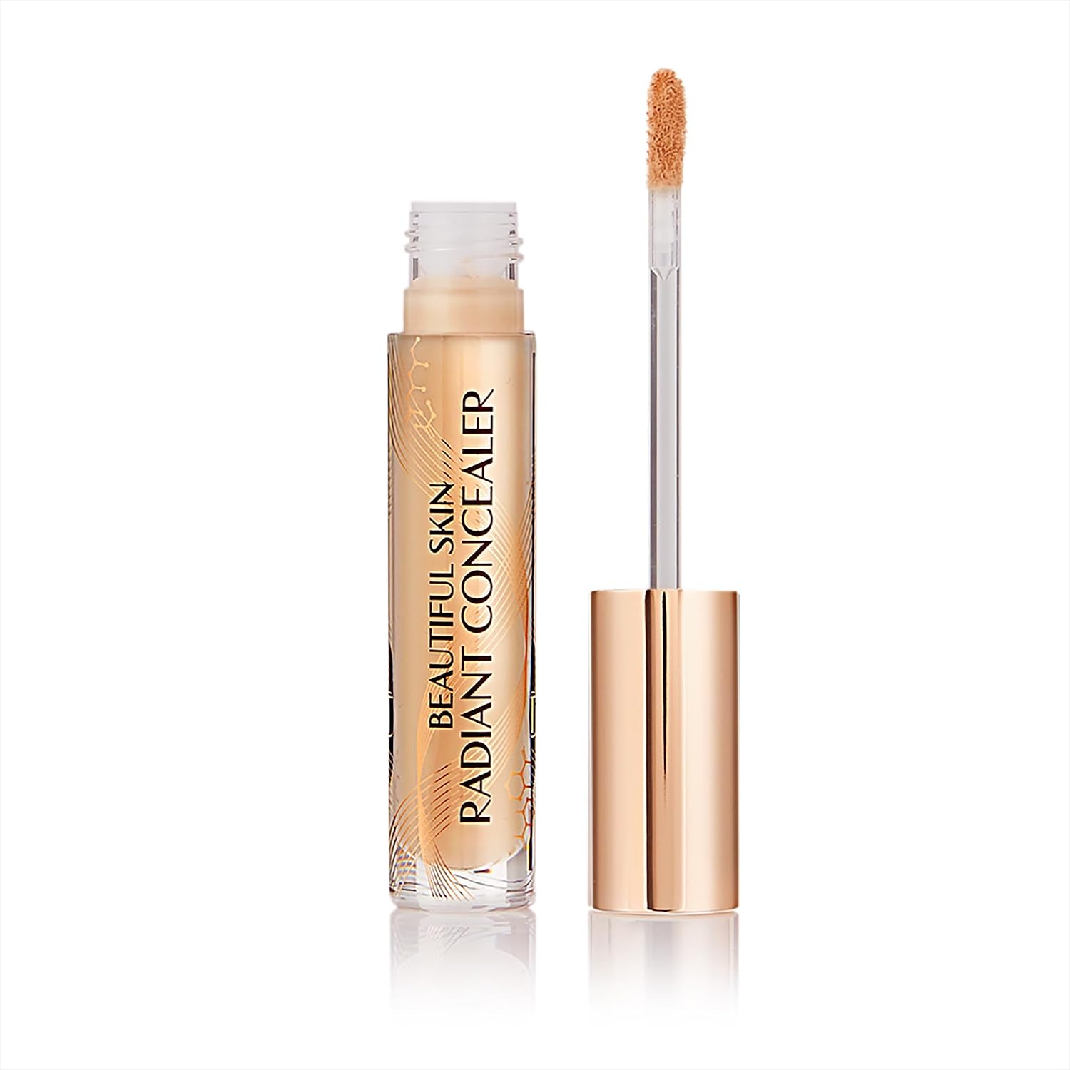 Charlotte Tilbury Beautiful Skin Radiant Concealer front view showing the clear tube and gold cap.