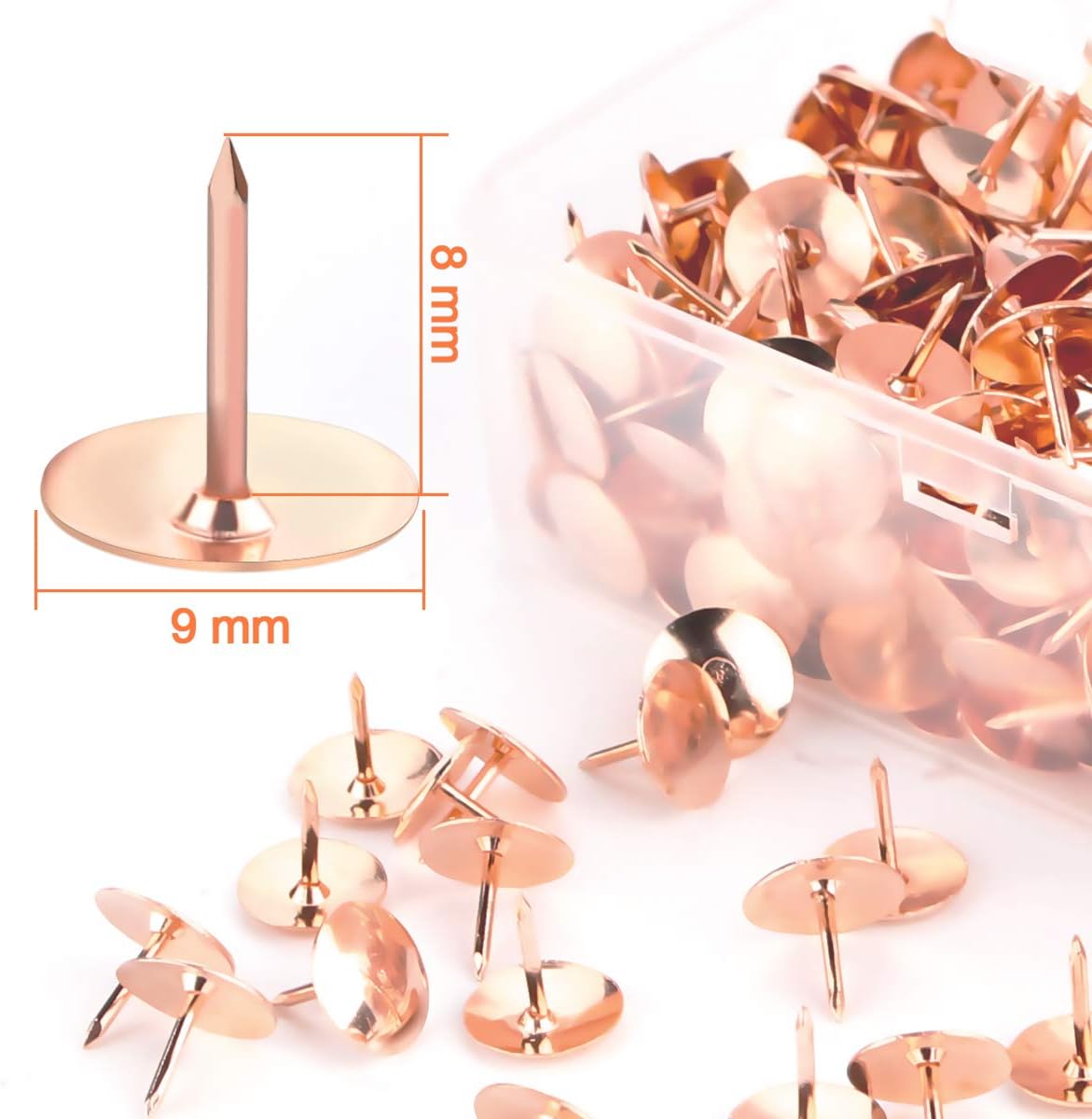 Yalis rose gold push pins closeup on a corkboard