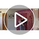Full festive party room setup utilizing the ZATAYE laser pink fringe curtains as an elegant entrance doorway display