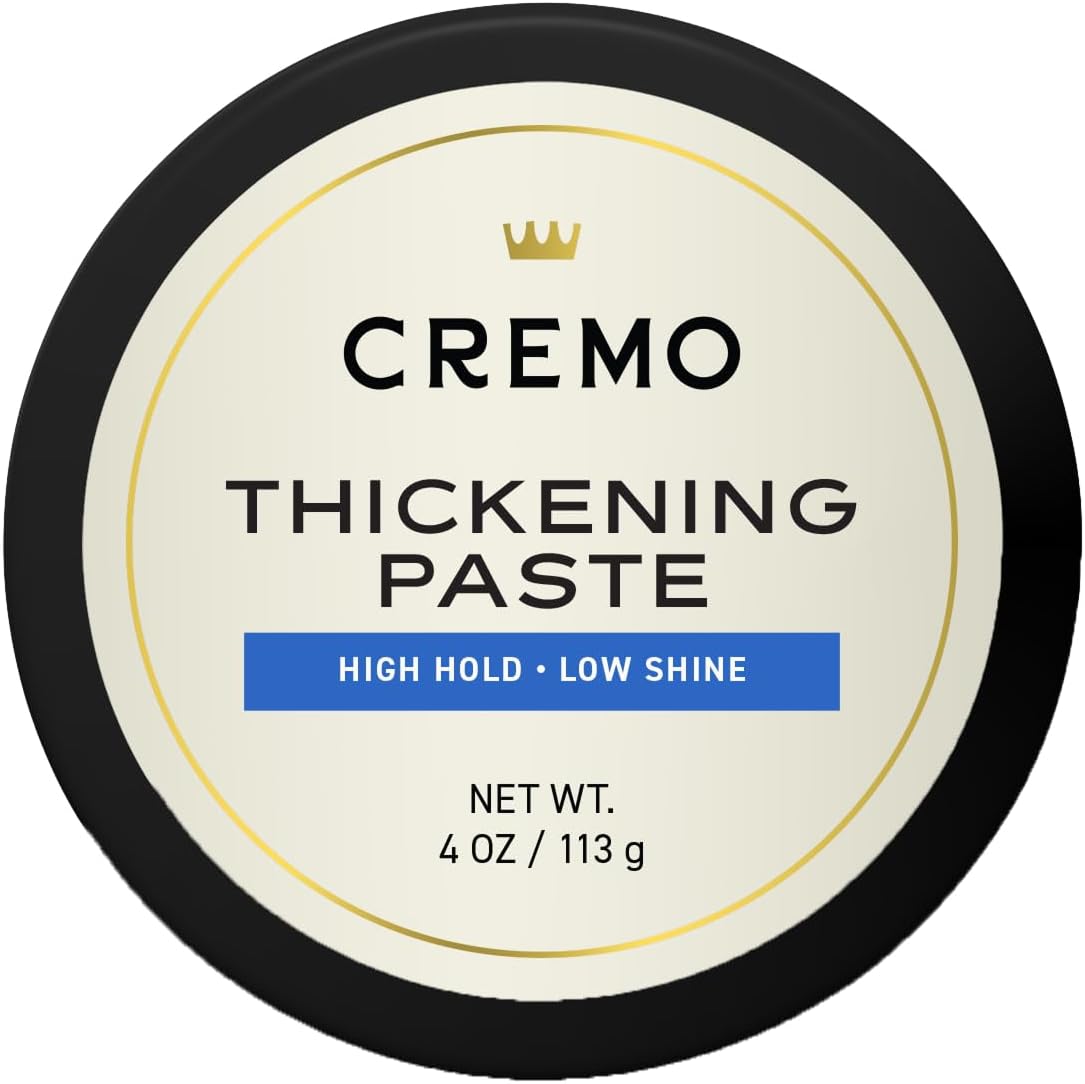Cremo High Hold and Shine Pomade in a blue 4 ounce jar