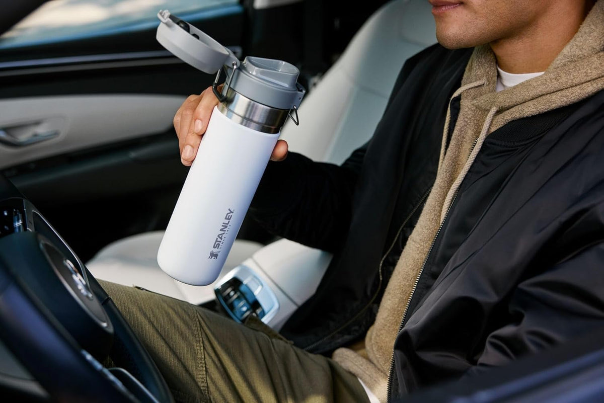 Authentic USA imported Stanley Quick Flip water bottle highlighting the carry loop.