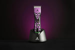 Andis professional dog grooming tool package with matching charging stand and adapter.