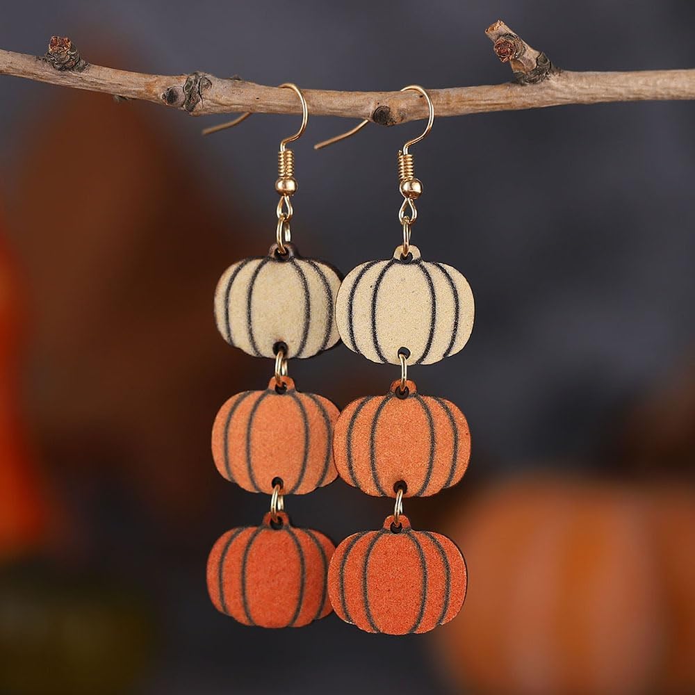Pingyongchang spooky drop dangle earrings close up on wooden texture