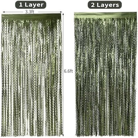 Dinosaur theme photo booth background using layered wavy green streamers.