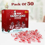 Close up of Yumzo red and white peppermint candy canes individually wrapped.