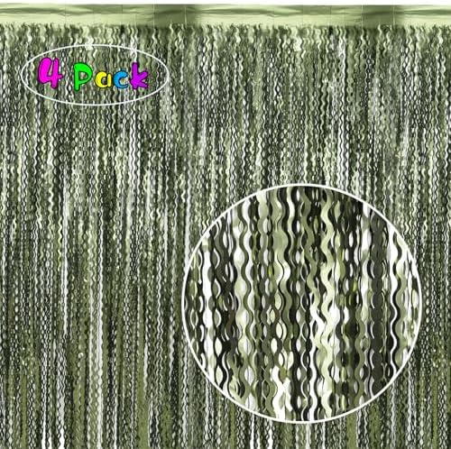 Four pack metallic foil fringe curtains in forest green hung on a wall.