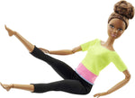 Barbie doll showing knee and leg flexibility in yoga pose.
