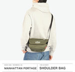 Manhattan Portage olive messenger bag showing New York skyline logo
