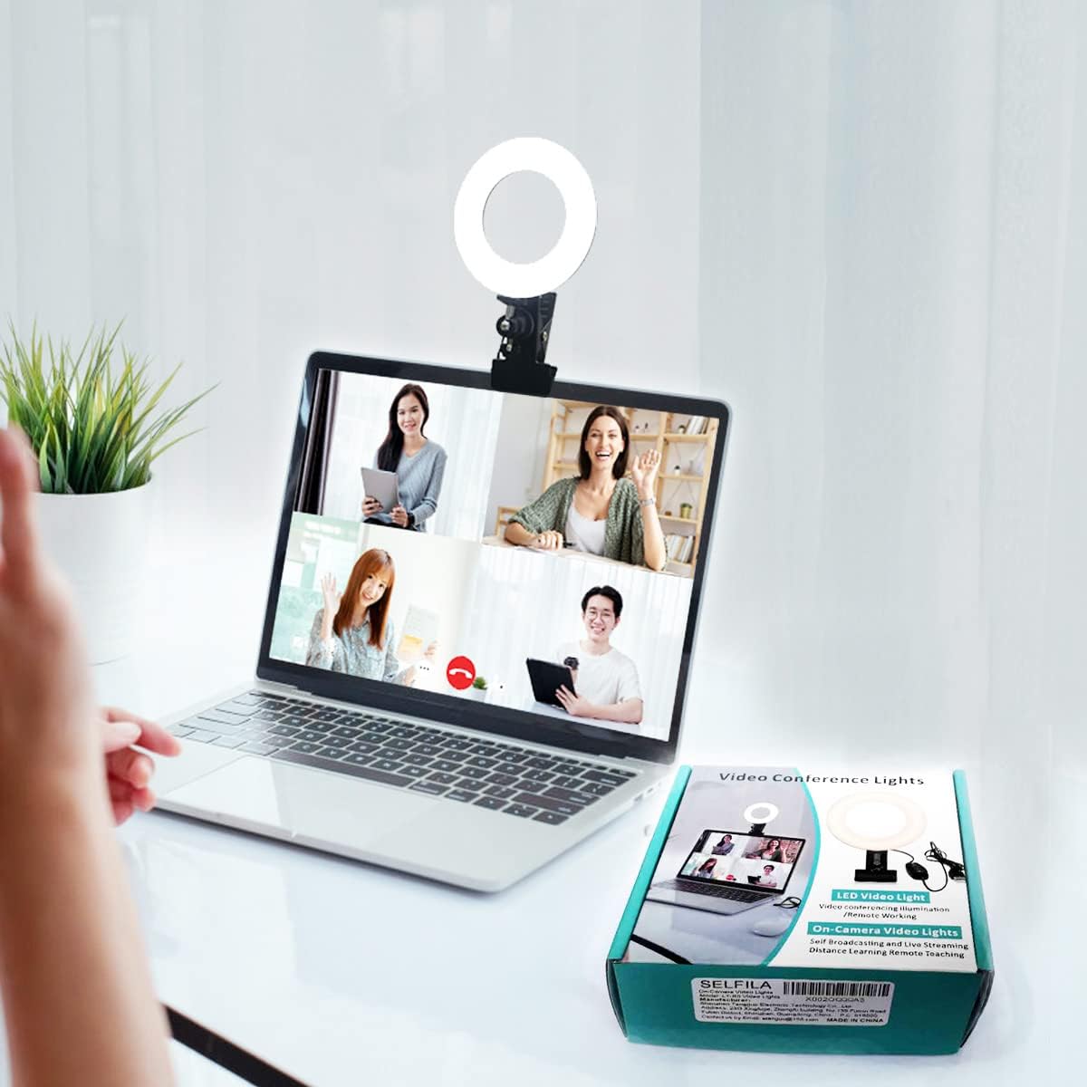 Selfila video conference lighting kit front view showing the five inch black LED ring light on a laptop screen.