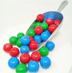 Assorted flavors of Kandyrifik gumballs including watermelon and cherry displayed on a clean background.