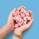 Melt away soft peppermint candy pieces showing authentic texture and shape.
