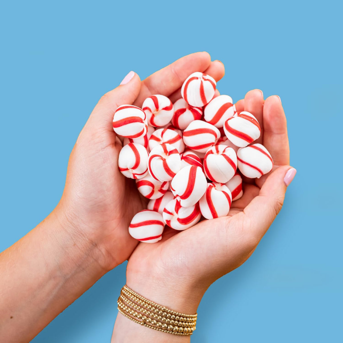 Melt away soft peppermint candy pieces showing authentic texture and shape.