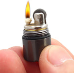 UOOPHEE World's Smallest Kerosene Lighter front view mini black capsule lighter for everyday carry gear