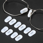IGeyzoe eyeglass nose pad covers front view of 18 pairs white silicone sleeves with cleaning cloth