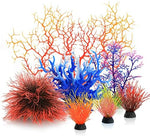 Vibrant multicolor fish tank decorations with heavy ceramic bases showcased together.